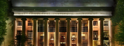 The MIT Great Dome illuminated at night.