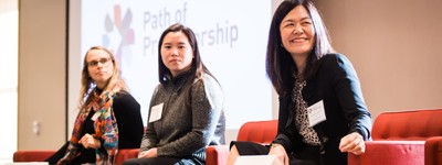 Panelists smile at the 2019 Path of Professorship conference.