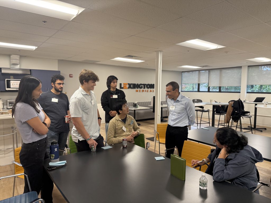MIT Mechanical Engineering students speak with Lexington Medical CEO Leon Amariglio during a site-visit Q&A, discussing the company’s approach to surgical-device innovation and engineering careers.