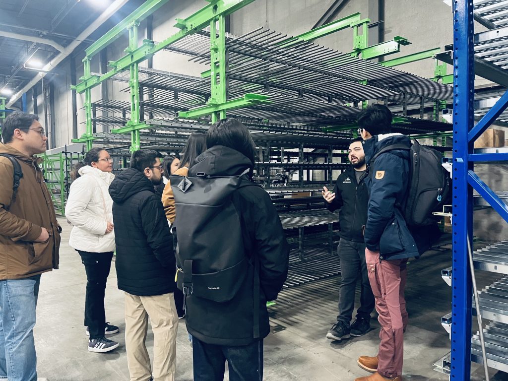 Group of student listening to the Symbotic representative 