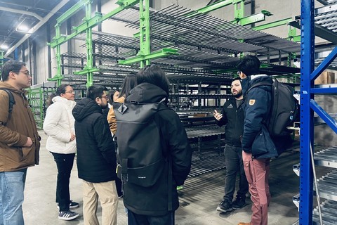 Group of student listening to the Symbotic representative