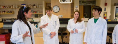 Lab Faculty explaining to group of students
