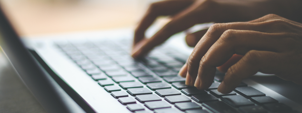 someone typing on a keyboard
