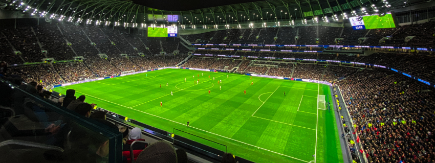 a wide angle view of a professional soccer game