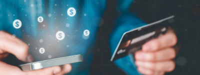 a credit card is being held to a phone