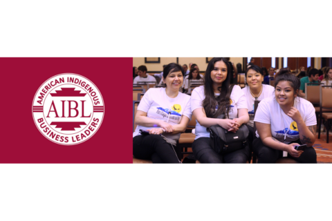 Red and White circular logo on left with photo of four students on right